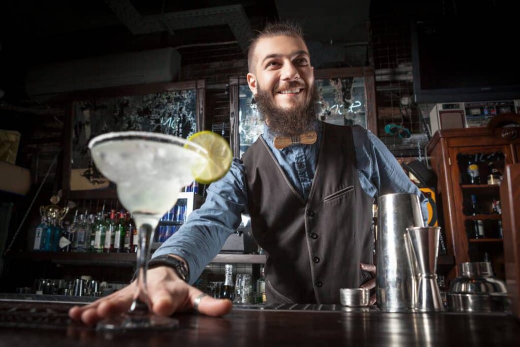 Barman Serving Cocktail